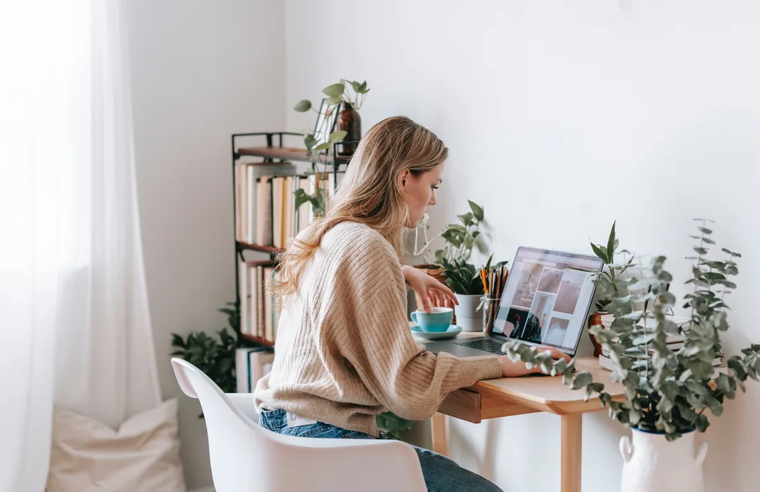 Beyond the Book: working remotely at a laptop.