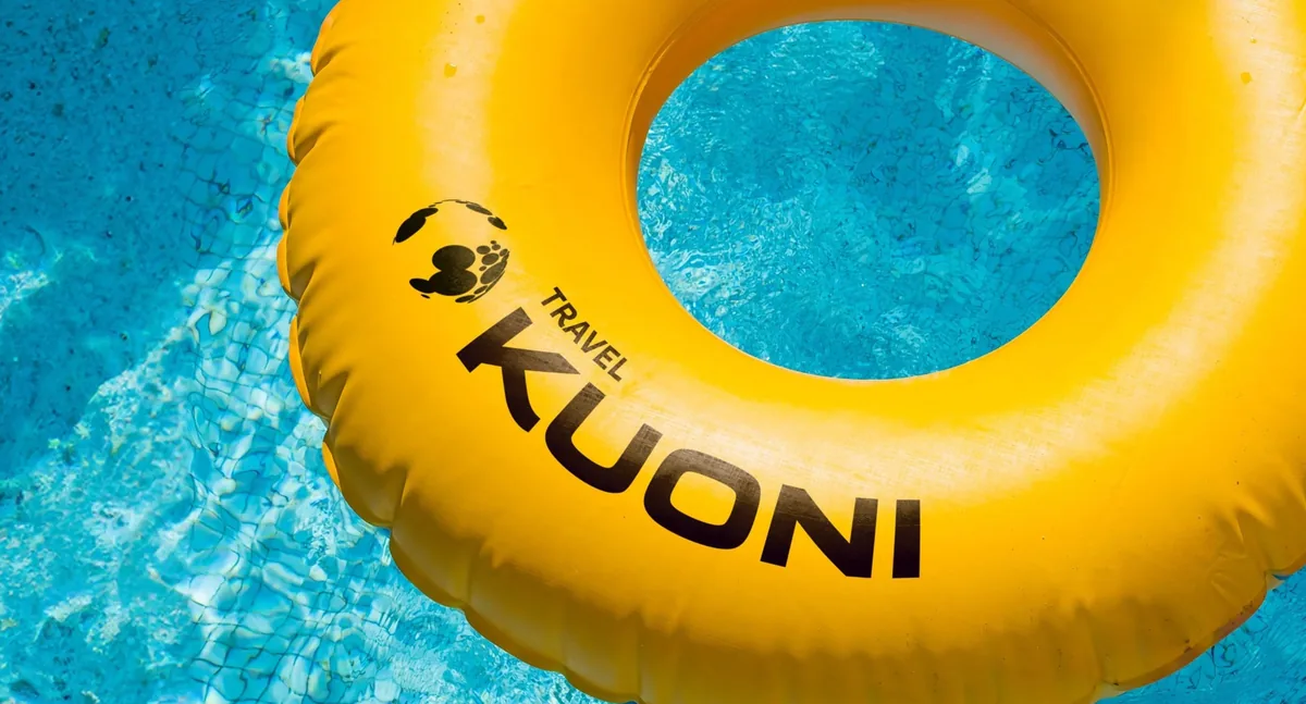Kuoni brand imagery of a swimmer in a pool, shot in the campaign's warm, unhurried style.