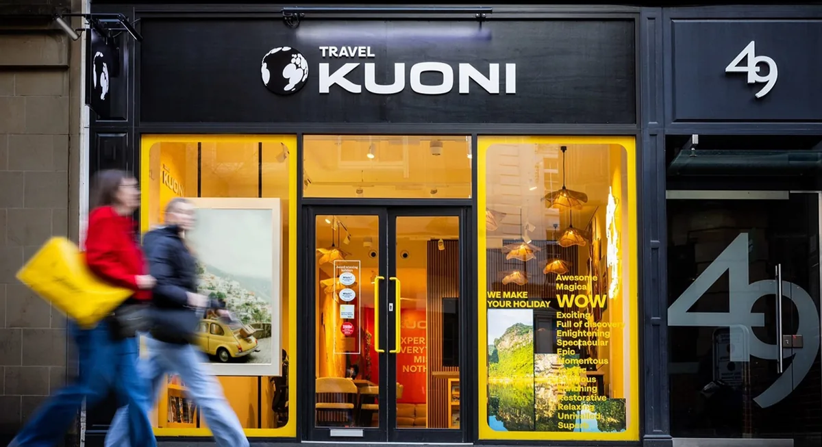 Kuoni retail storefront with the new brand identity applied to signage and window graphics.