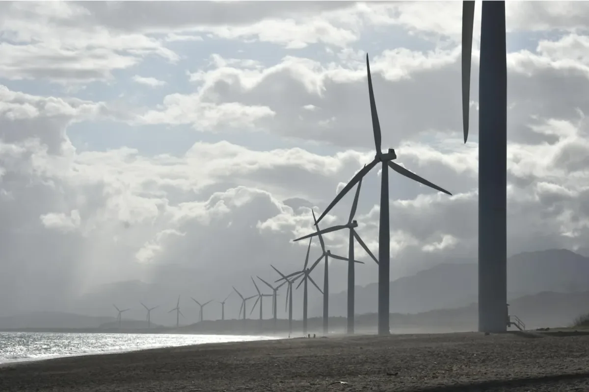 The Old School Yard Co: wind turbines along a coastline, the kind of offshore installation it supplies into.